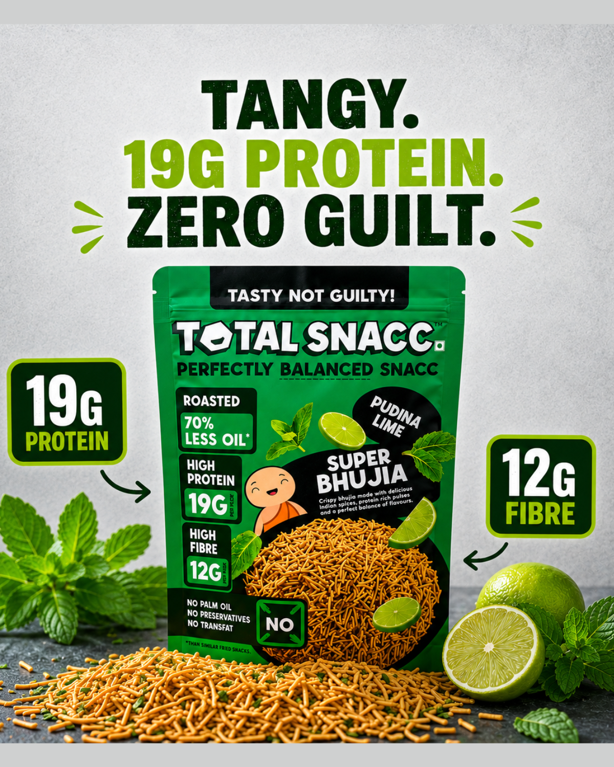 A promotional product shot for Total Snacc Super Bhujia snack packets. The green and black bag is centered on a textured light gray background, with loose brown snack pieces spilled in front, lime halves, mint leaves, and callout badges highlighting 19g protein and 12g fibre.